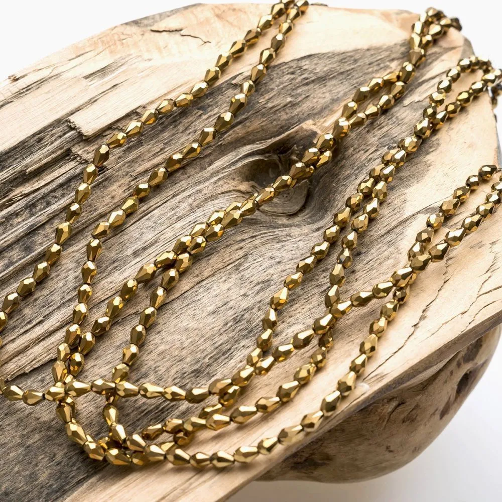 бусина "капля", граненая, стекло, цвет золотой металлик, 5х3мм