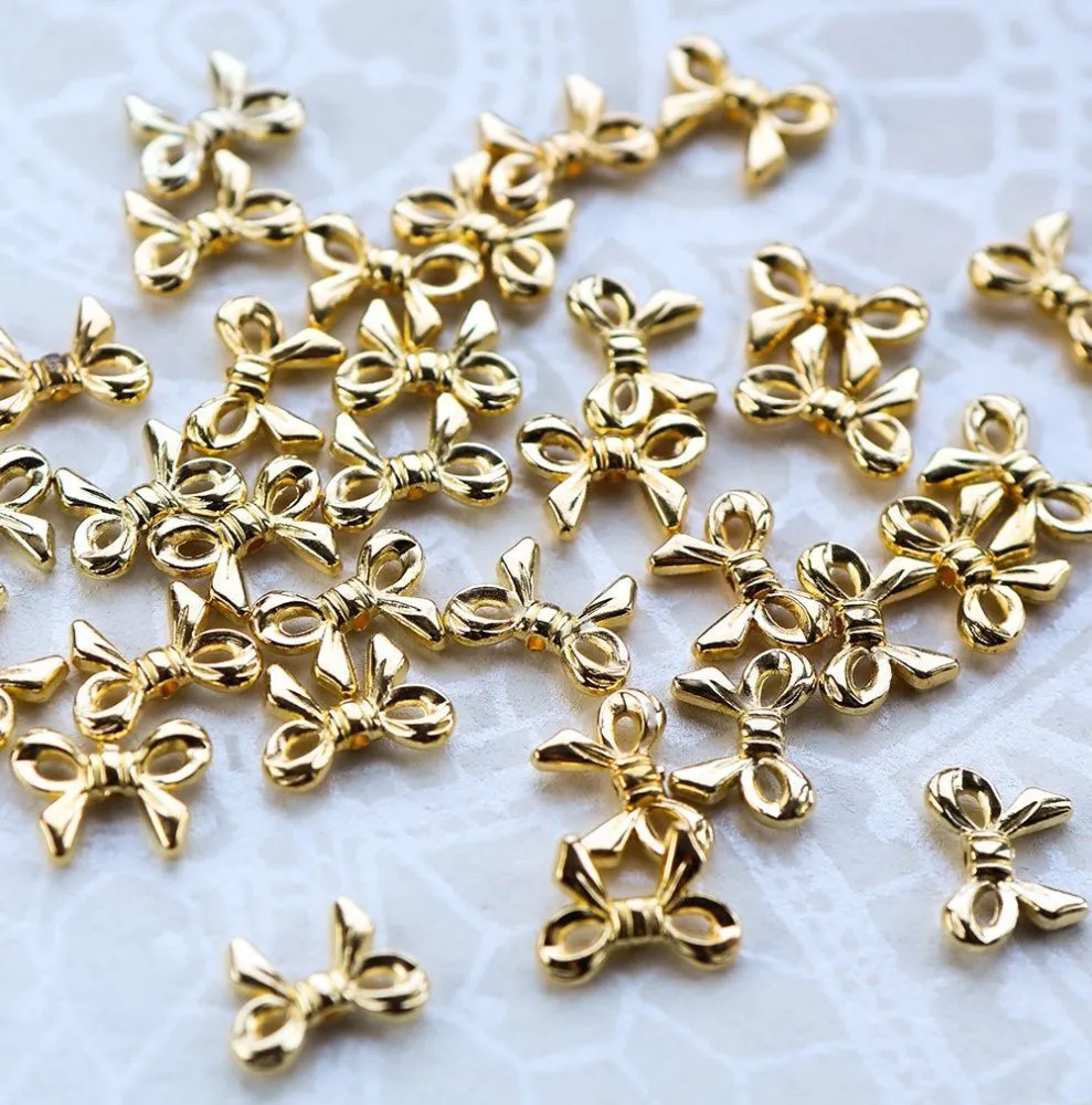 разделитель для бусин "бантик", цвет золото, 14x10x3 мм