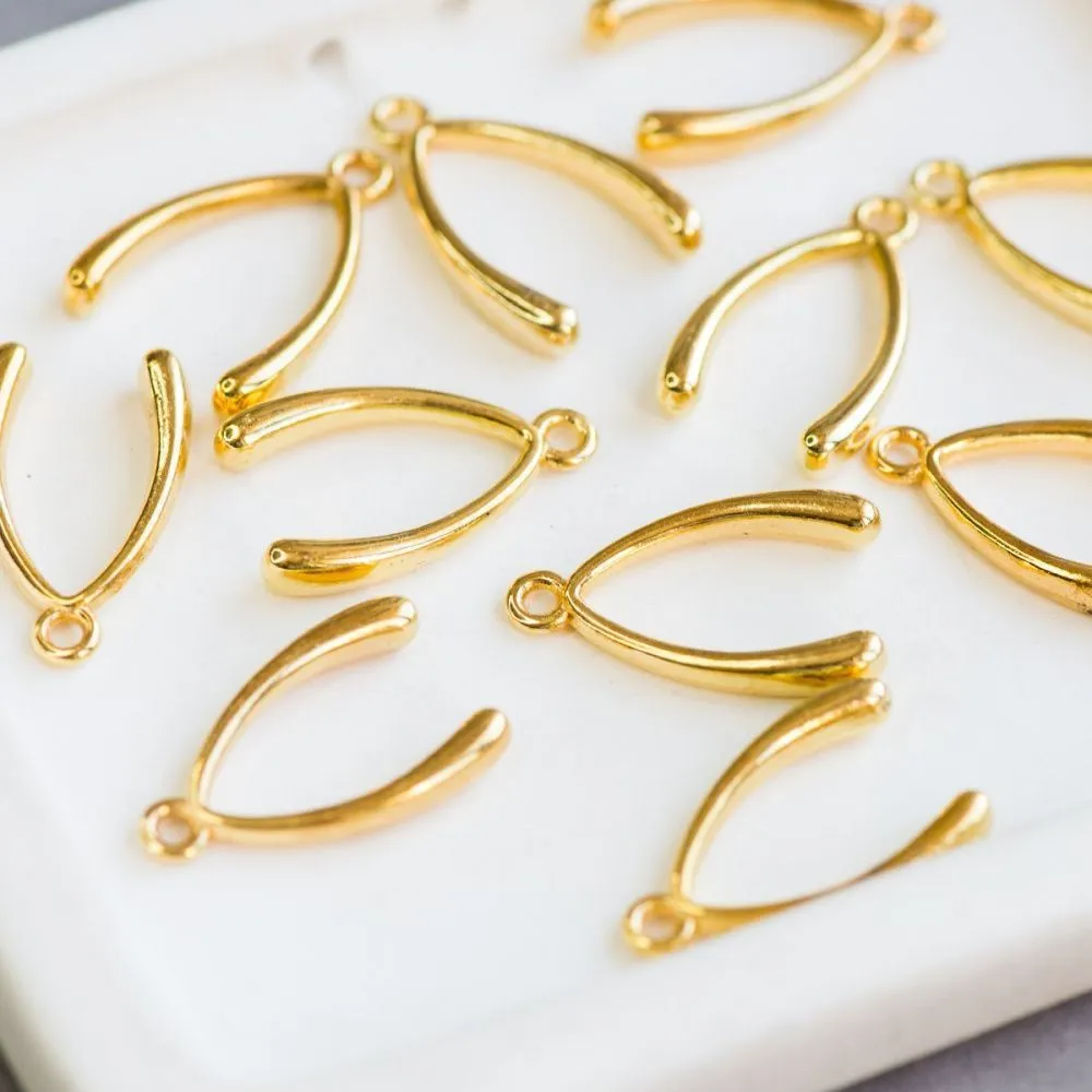 подвеска металлическая "косточка удачи", цвет золото, 24x15x4 мм