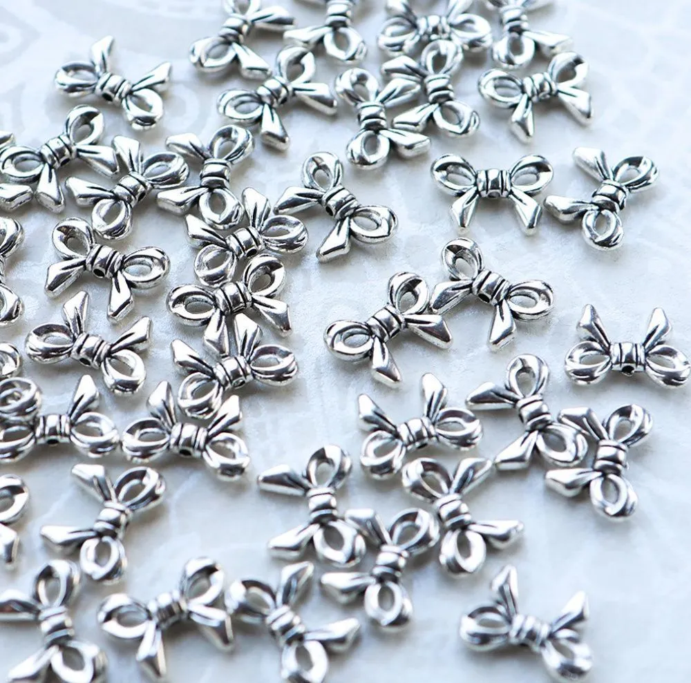 разделитель для бусин "бантик", цвет античное серебро, 14x10x3 мм